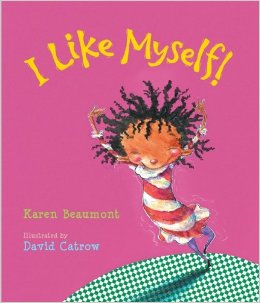 The cover of the book "I Like Myself." The cover is pink with a girl dancing around.